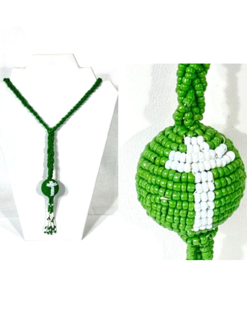 Green and white beaded lariat necklace with white cross.